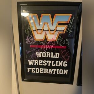 WWF AUTOGRAPHED POSTER
(16 LENGTH 11 WIDTH)